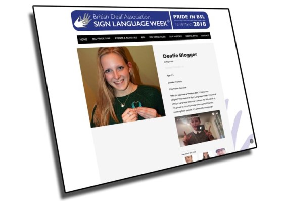 Picture of a website screenshot with Deafie Blogger holding her hearing aids in a heart shape on a webpage for Sign Language Week