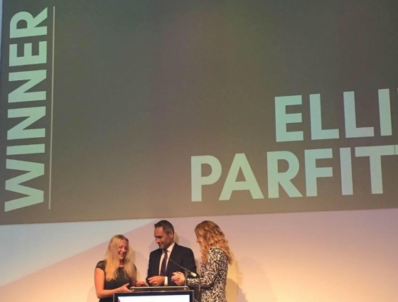 Me on the stage collecting my award from Mark, with Pip Tomson on the right, my name in big on the big screen behind 'winner'